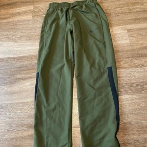 Olive green Nike sweatpants, medium